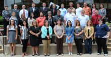 Group photo of ECU's new faculty for 2013-14