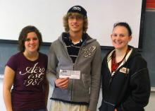 Photo of students with check