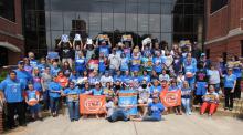 Photo of students gathering around to show their support for the OKC Thunder