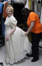 Emelia Robinson, who plays Grandma Tzeitel, is fitted for a dress by costume designer Raegan Thomas in preparation for East Central University’s 2016 production of “Fiddler on the Roof.” The production is set for March 3-5 at 7:30 p.m. each night in the Ataloa Theatre of the Hallie Brown Ford Fine Arts Center.