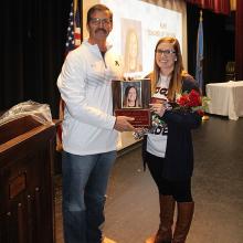 Noelle Hurt-Bryan presented with Ada District Junior High Teacher of the Year Award from Principal Ronny Johns.