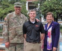 ECU sophomore Jacob Hobbs, center, will be among the first student-soldiers to participate in the relaunched GOLD Program next fall. At left is Major General Michael Thompson of the Oklahoma Army National Guard and at right is Dr. Katricia Pierson, ECU president