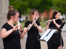 Dayna Dawson of Ardmore, center, performs with fellow ECU music students at an outdoor concert in May 2021.