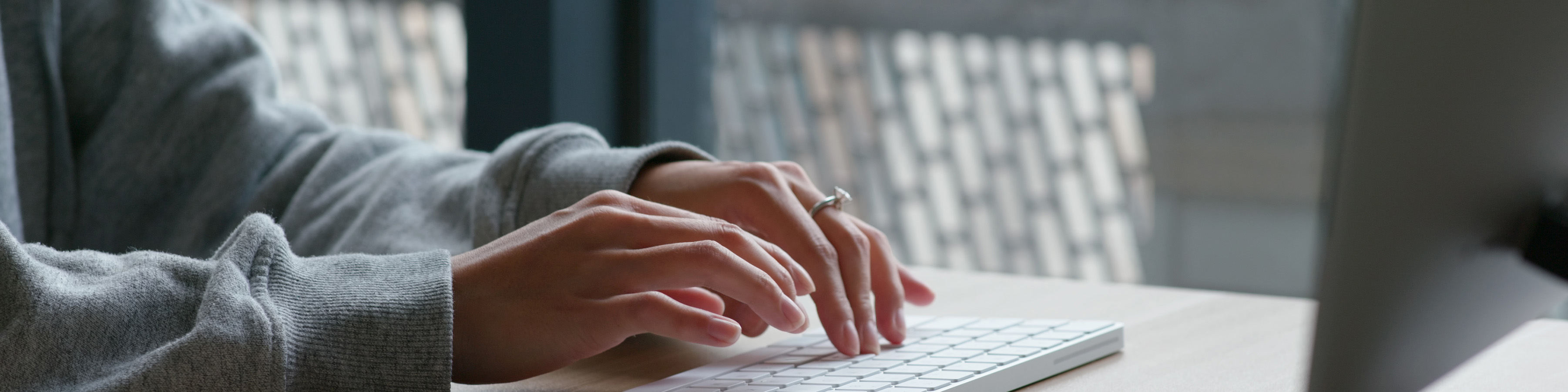 person typing on a computer