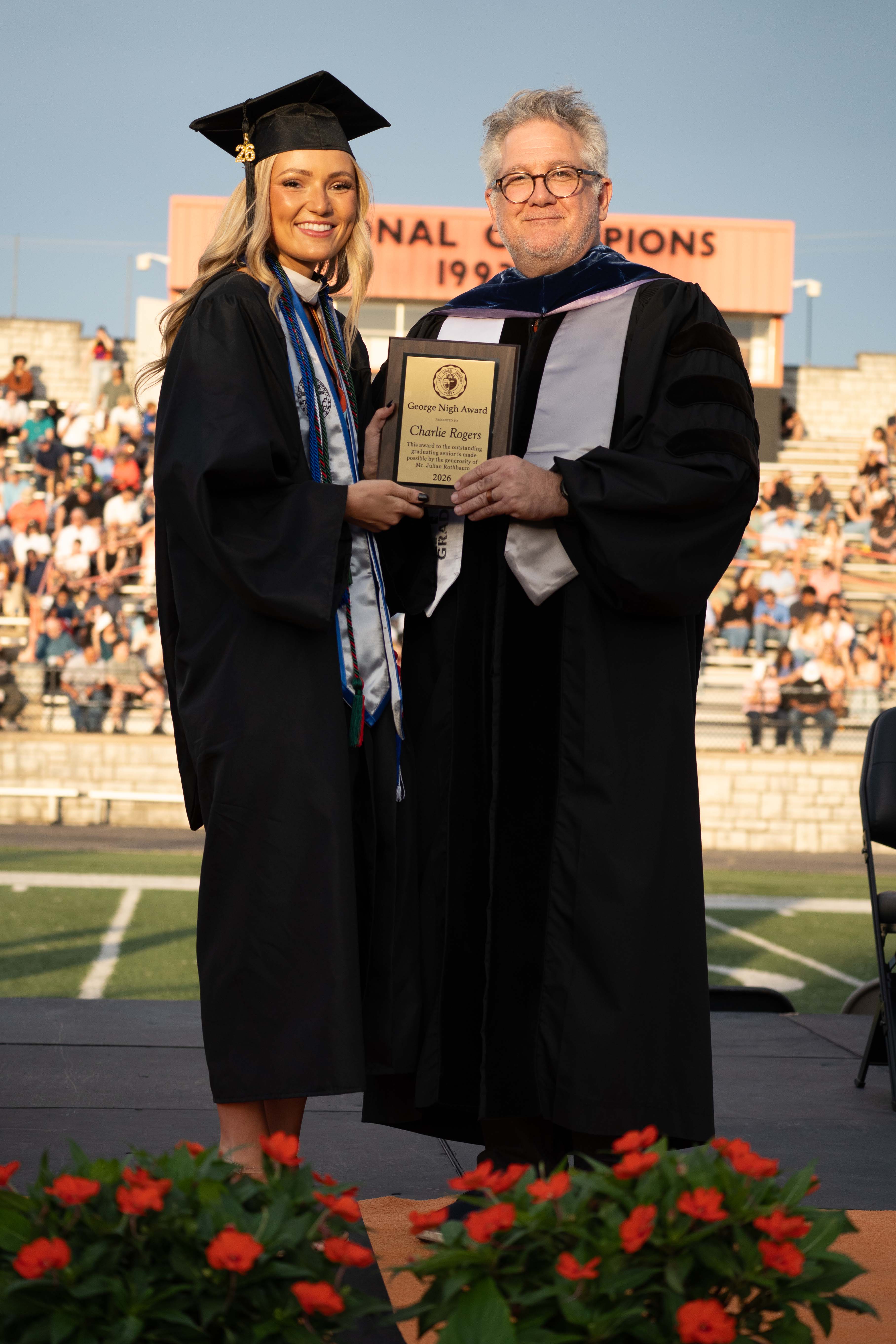 Charlie Rogers accepting plaque