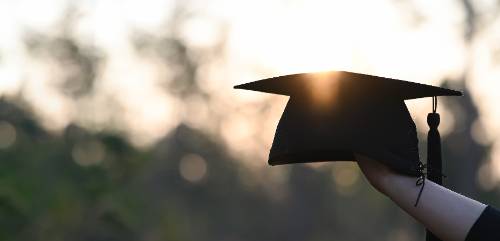 cropped image of university student hand