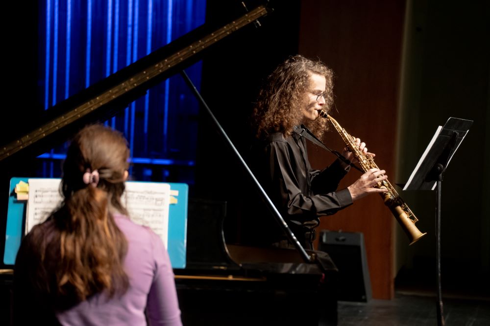 Student performing on stage