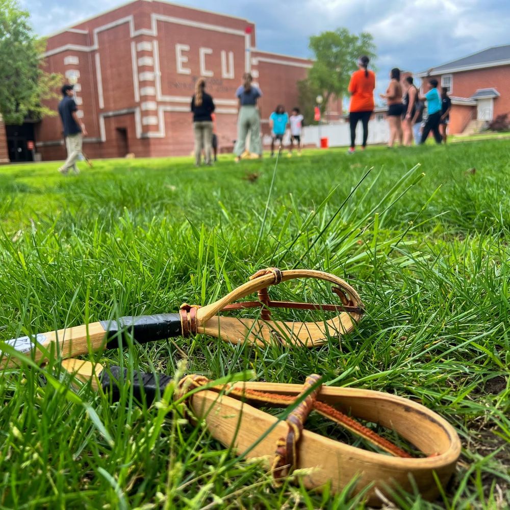 Stickball on the Bill S. University Center lawn