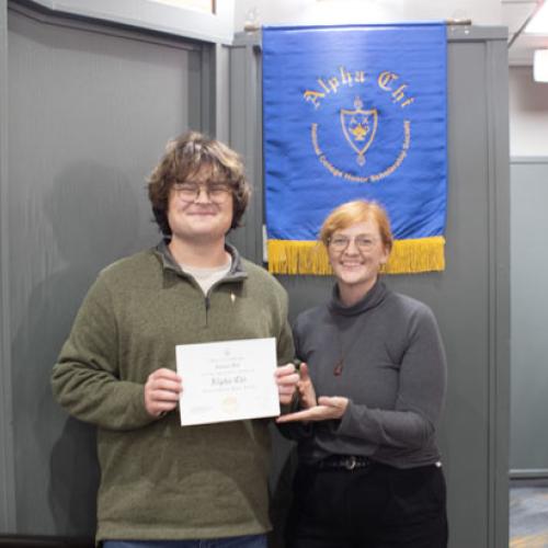 ECU Student being inducted into Alpha Chi