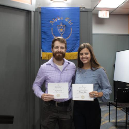 ECU Student being inducted into Alpha Chi