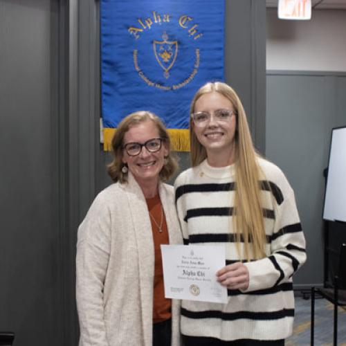 ECU Student being inducted into Alpha Chi