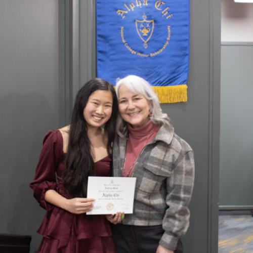 ECU Student being inducted into Alpha Chi