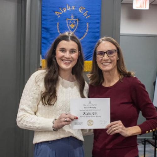 ECU Student being inducted into Alpha Chi