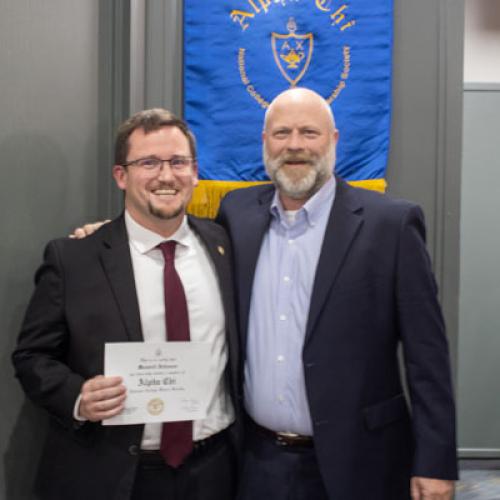 ECU Student being inducted into Alpha Chi