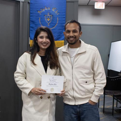 ECU Student being inducted into Alpha Chi