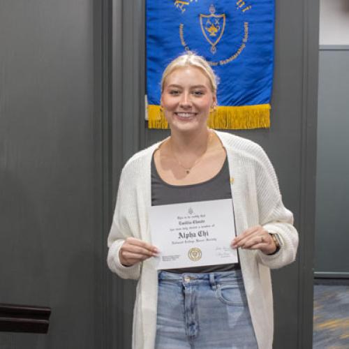 ECU Student being inducted into Alpha Chi