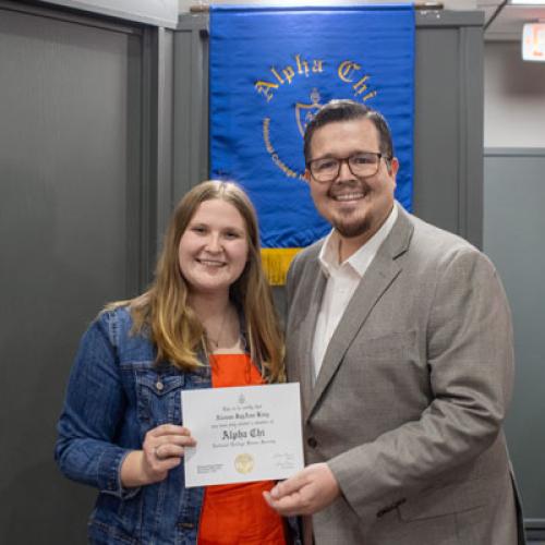 ECU Student being inducted into Alpha Chi