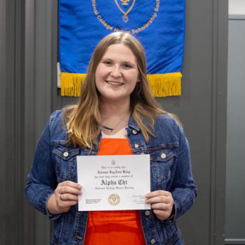 ECU Student being inducted into Alpha Chi