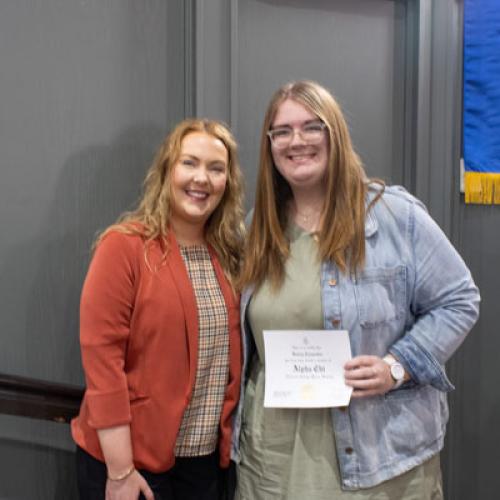 ECU Student being inducted into Alpha Chi