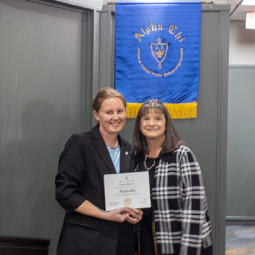 ECU Student being inducted into Alpha Chi