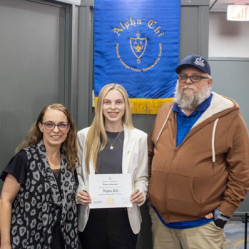 ECU Student being inducted into Alpha Chi