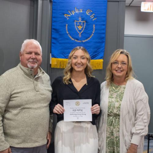 ECU Student being inducted into Alpha Chi