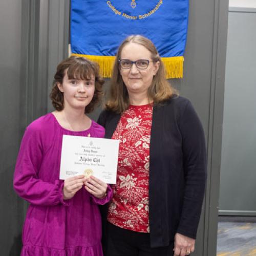 ECU Student being inducted into Alpha Chi