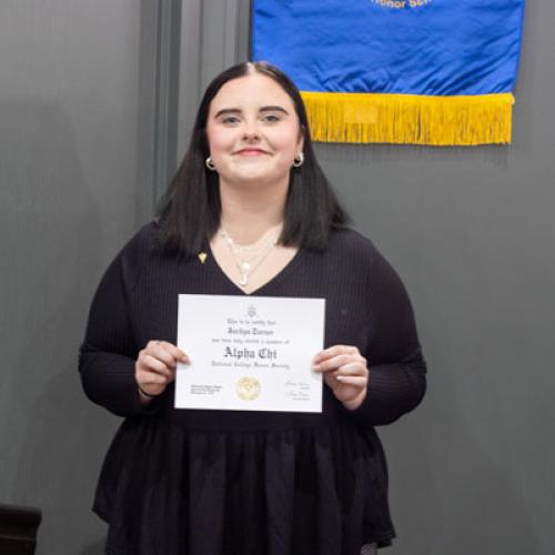 ECU Student being inducted into Alpha Chi