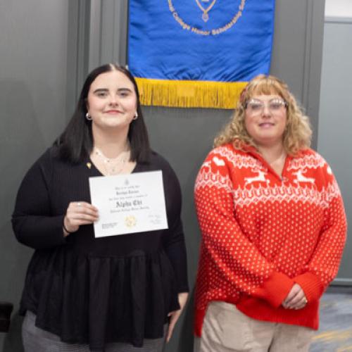 ECU Student being inducted into Alpha Chi