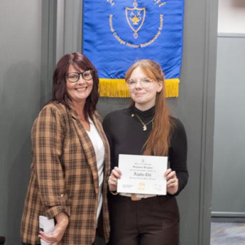 ECU Student being inducted into Alpha Chi