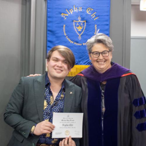 ECU Student being inducted into Alpha Chi