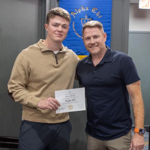 ECU Student being inducted into Alpha Chi