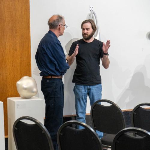 ECU faculty members discuss art and the contents of Kayla Ohlmer's talk.