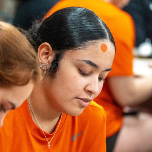 A student scans her card with bingo on her mind.