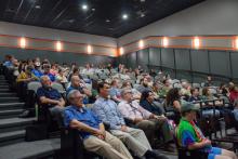 Crowd seated in Estep Multimedia Center